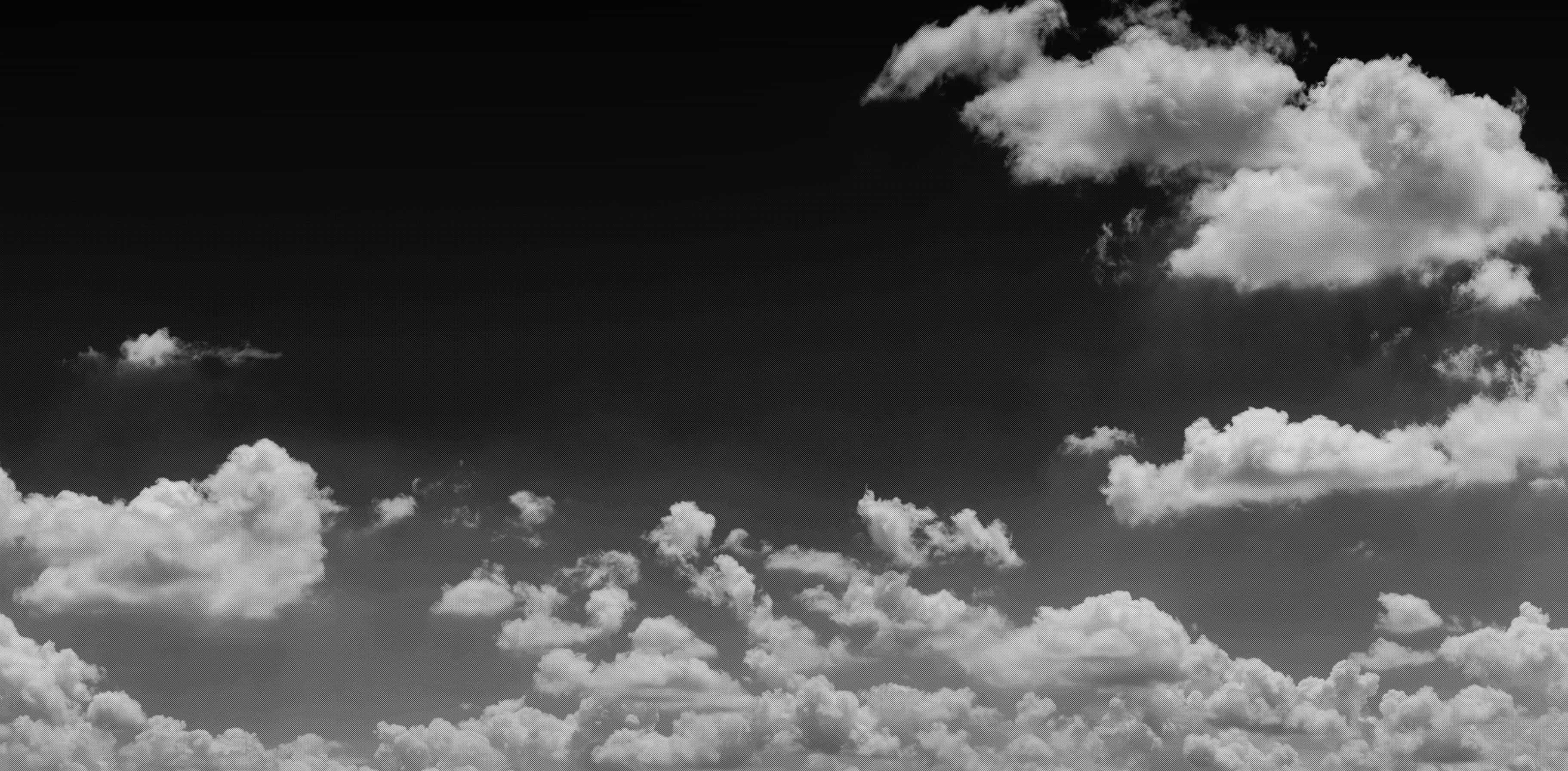 Svartvit bakgrundsbild som visar mörka moln